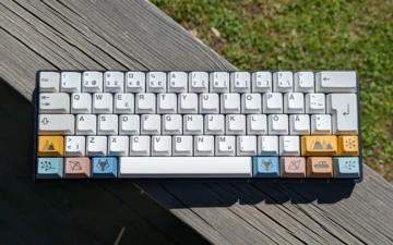 A bird's eye view of my computer keyboard. It's laying on the balcony railing, enjoying the sun an early spring day.